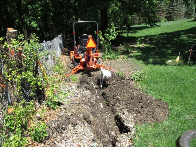 West Side Fence and Drainage