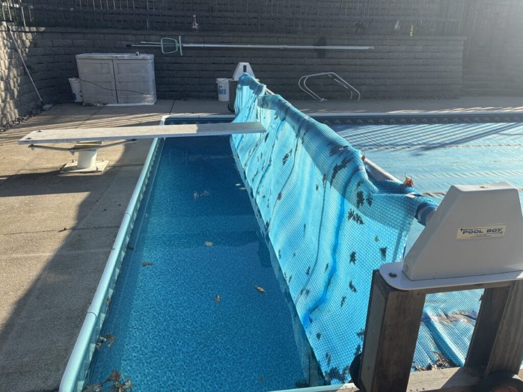 Pool Boy on jacks above diving board