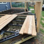 This picture shows the first four boards after they are installed. The boards will be trimmed to match the angle, in place. That saves a lot of time and gets a cleaner result. Started Decking