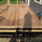 The accent board between the center and west sections has been added after the deck boards were trimmed. Accent Board