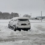 We woke up to 10-12" of new snow. Snow covered truck