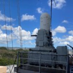 During the refit on the 80s they added this gun emplacement. It is a 20MM Gatling gun used to shoot down missiles and aircraft. Battleship Missouri - CWIZ?