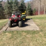 This picture shows how the tractor and ATV will be parked in the new shed. Testing a layout
