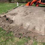 All of the sod has been removed. Now I need to dig out the excess dirt and flatten the trench. First pass done.
