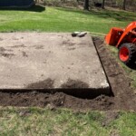 The trench to the right has been flattened and packed. Flattening trench