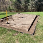 The edging has been installed, the trenches flattened and packed. Ready for rock. Ready for rock.