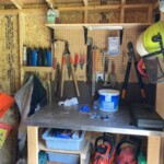 Inside the shed I have a small workbench and pegboard. Workbench