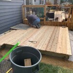 This shows the majority of the deck boards in place. Decking