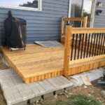 The deck has 2 coats of stain and is already in use. Stained Deck