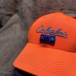 A helmet mount fastened to a hat. Hunting with a GoPro, helmet mount detail.