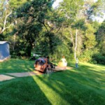 Laying down plywood to protect the grass Laying down plywood to protect the grass
