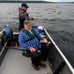 Darryl with a small trout on Fish on